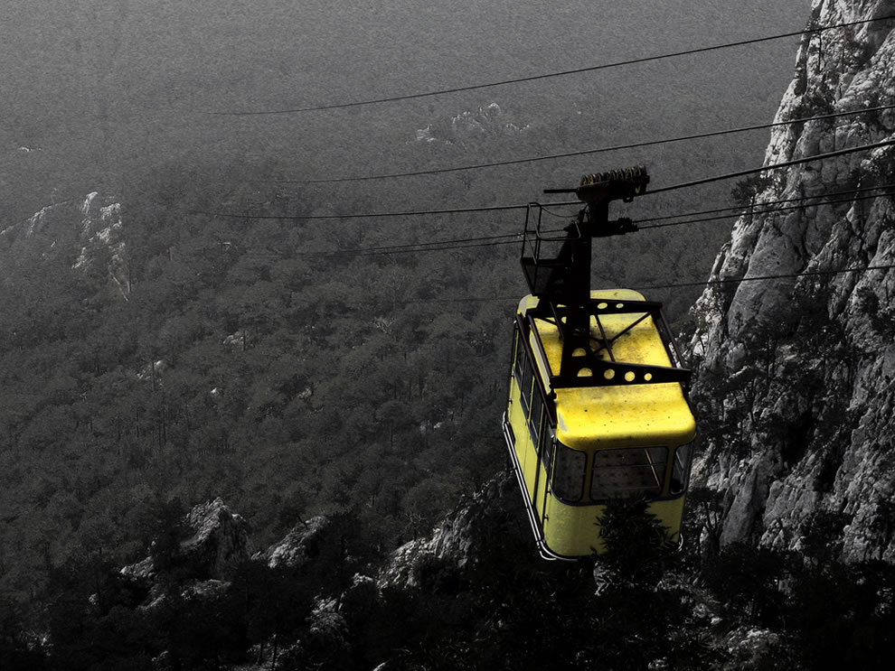 different-perspective-in-crimea-yellow-cable-car-over-yalta-forest